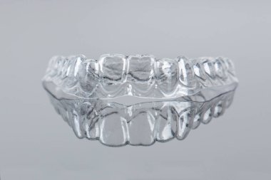 Invisible orthodontics cosmetic brackets. Tooth aligners, for beautiful smile.