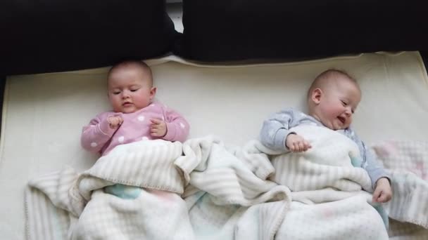 Two Girls Sisters Lie Bed Two Baby Twins Bed — Stock Video