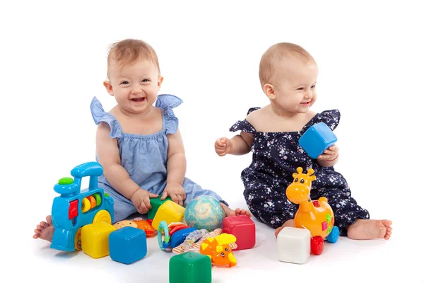 Two Cute Baby Girls Playing Toys Isolated White Having Fun — Stock Photo, Image