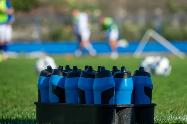 Sport Bottles Fresh Water Energy Drink Asoccer Football Field — Stock Photo, Image