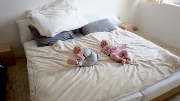 Two Girls Sisters Lie Bed Two Baby Twins Bed — Stock Video