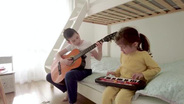 Boy Girl Having Fun Together Playing Music Home Brother Plays — Stock Video