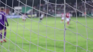 Futbol, futbol maçı. Futbol maçının bulanık görüntüsü. Futbol ağına odaklan.