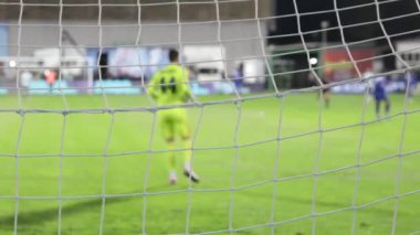 Futbol, futbol maçı. Futbol maçının bulanık görüntüsü. Futbol ağına odaklan.