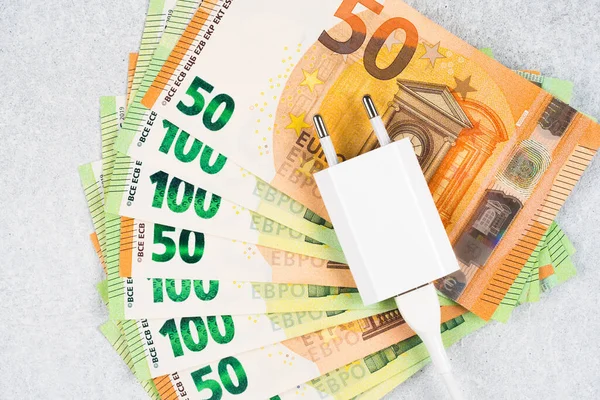 White Charger Plug Many Euro Banknotes Light Concrete Background European — Stock Photo, Image