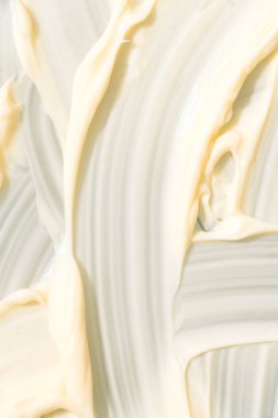 Fotokopi alanı olan krema dokusu. Krema lekeleri. Doğal cilt bakımı ürünü. Dikey resim