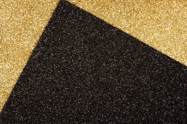 Fotokopi alanı olan altın ve siyah renklerde gösterişli soyut simler. Minimum modaya uygun arka plan. Neşeli arkaplan