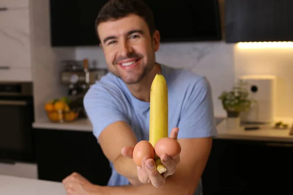 Portrait Handsome Young Man Holding Banana Kitchen — Stock Photo, Image