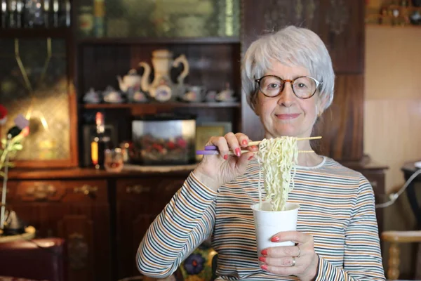 Close Portrait Mature Woman Eating Cup Noodles Home — Foto Stock