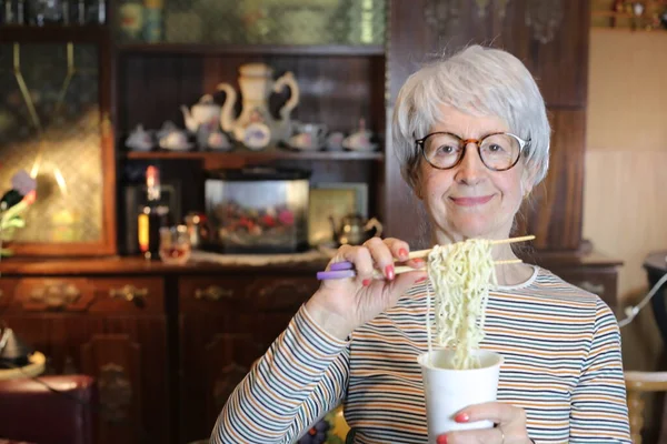 Close Portrait Mature Woman Eating Cup Noodles Home — Foto Stock