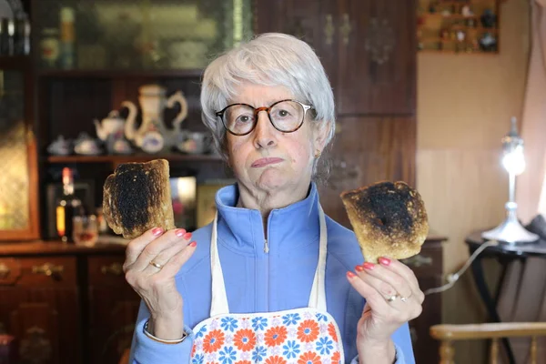 Close Portrait Mature Woman Overroasted Toasts Home — Stock Photo, Image
