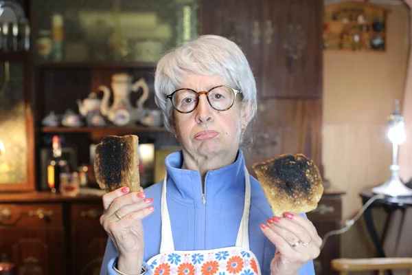 Close Portrait Mature Woman Overroasted Toasts Home — Stock Photo, Image
