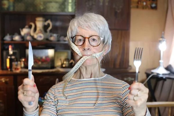 Close Portrait Mature Woman Cutlery Measuring Tape Home — Stok fotoğraf