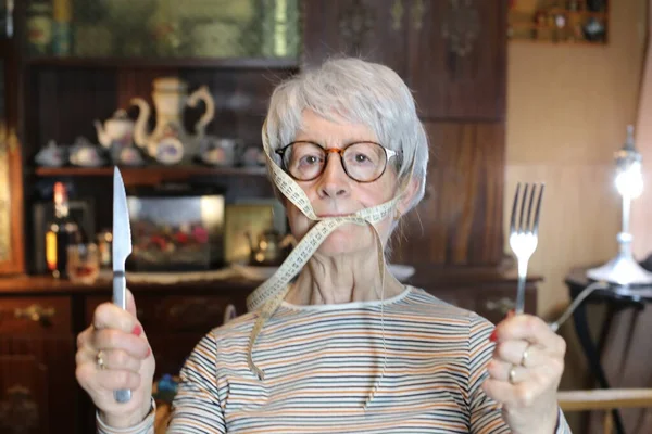 Close Portrait Mature Woman Cutlery Measuring Tape Mouth Home — Stok fotoğraf