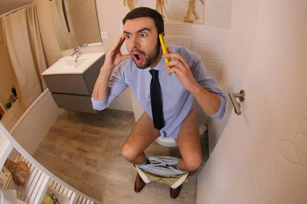 Wide Angle Shot Expressed Young Man Talking Phone Toilet — Stockfoto