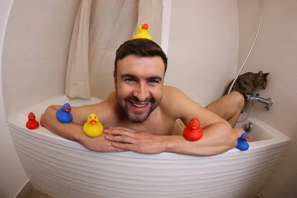 Wide Angle Shot Handsome Young Man Rubber Ducks Bath — 图库照片