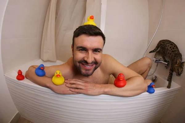 Wide Angle Shot Handsome Young Man Rubber Ducks Bath — Stockfoto