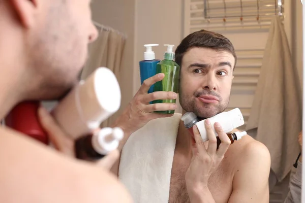 Portrait Handsome Young Man Bottle Hygiene Supplies Front Mirror Bathroom — Stock Photo, Image