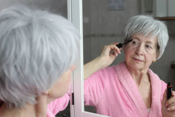 Close Portrait Mature Woman Doing Makeup Front Mirror Bathroom — Stock Photo, Image