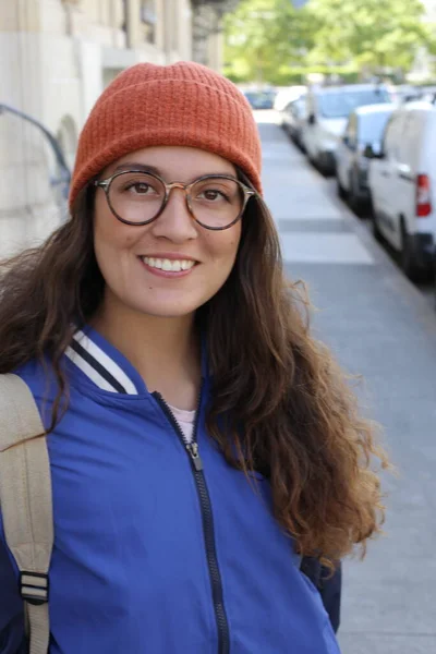 stock image portrait of beautiful young woman in stylish clothes on city street