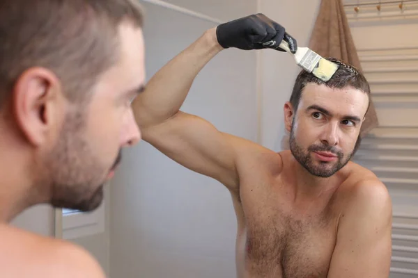 Portrait Young Man Painting His Hair Front Mirror Bathroom — Stock Photo, Image