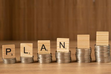 The concept of planning and budget allocation. Wooden cubes with the word 