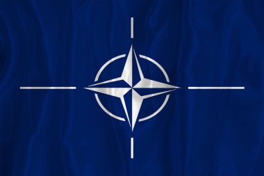 Flag of the North Atlantic Treaty Organization (NATO) NATO flag on a silk background Fabric texture The official state symbol of the country