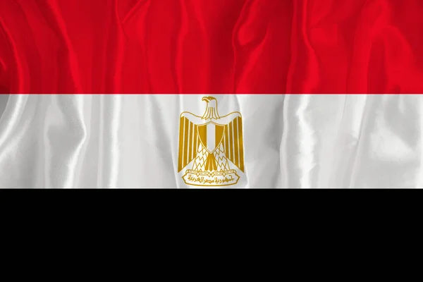 絹の背景にエジプトの旗は偉大な国家のシンボルです 生地の質感国の公式シンボル — ストック写真