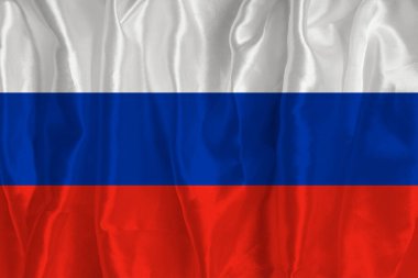 İpek arka planda Rusya bayrağı büyük bir ulusal semboldür. Kumaş dokusu Ülkenin resmi devlet sembolü