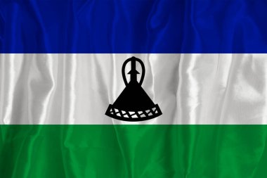 İpek arka planda Lesotho bayrağı büyük bir ulusal semboldür. Kumaş dokusu Ülkenin resmi devlet sembolü