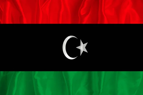 Vlajka Libye Hedvábném Pozadí Skvělým Národním Symbolem Textura Tkanin Oficiální — Stock fotografie