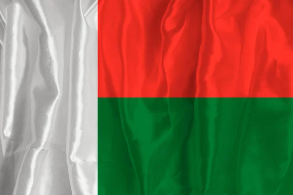 Vlajka Madagaskaru Hedvábném Pozadí Skvělým Národním Symbolem Textura Tkanin Oficiální — Stock fotografie