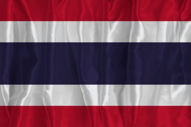 İpek arka planda Tayland bayrağı büyük bir ulusal semboldür. Kumaş dokusu Ülkenin resmi devlet sembolü
