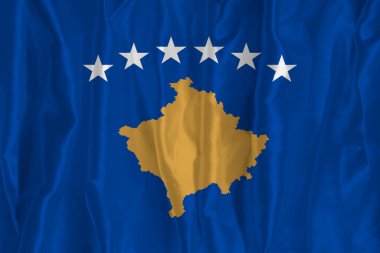 İpek arka planda Kosova bayrağı büyük bir ulusal sembol. Kumaş dokusu Ülkenin resmi devlet sembolü