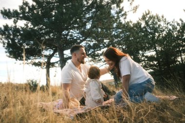 A warm and loving family enjoying treasured quality time together in a serene and peaceful outdoor setting