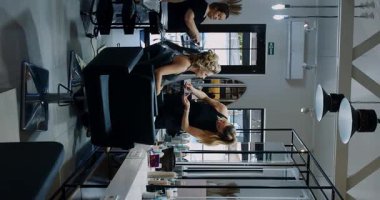 A chic modern hair salon that showcases skilled stylists offering an array of exquisite hair services for clients