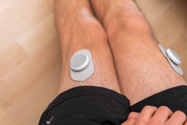 TENS electronic massager, muscle stimulator for pain relief, transcutaneous electrical nerve stimulation