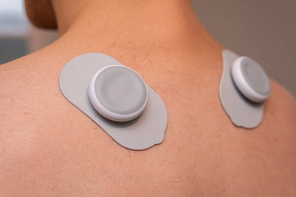 TENS electronic massager, muscle stimulator for pain relief, transcutaneous electrical nerve stimulation