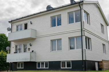 Sweden, Knislinge  July 7, 2022: Beautiful decorated facade of a typical private residential house in Europe. Architecture, stylish house. Concept of a building. Summer house.