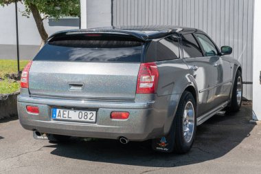 Sweden, Knislinge  July 16, 2022: Sparkling painting of a car on a sunny day
