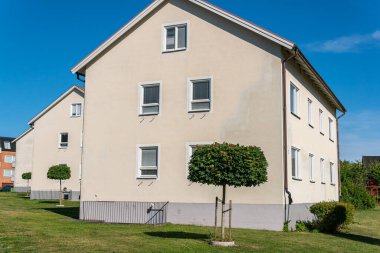 Sweden, Knislinge  July 30, 2022: Typical low-rise housing, residential building in Europe. Urbanism, architecture. Concept of a building.