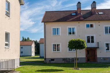 Sweden, Knislinge  July 30, 2022: Typical low-rise housing, residential building in Europe. Urbanism, architecture. Concept of a building.