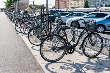 Sweden, Knislinge  August 8, 2022: A lot of different bicycles parked outdoors in the city