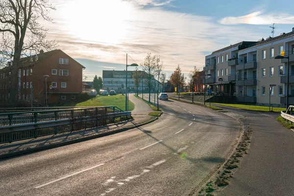 stock image Sweden, Knislinge  November 20, 2022: Beautiful sunset in the town, road and residential building. Urbanism. 