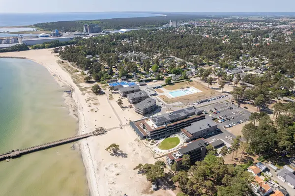 stock image Aerial view of a resort and recreational hotel near the sea. Beautiful sea, maritime landscape, seascape.