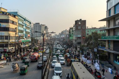 Dhaka, Bangladesh - 05.16.2023: Busy street in Dhaka, Bangladesh with bustling traffic and pedestrians