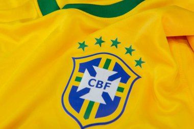 Bauru, Brazil - 11.01.23: Brazilian Football Confederation emblem on football jersey. Most times world champion selection shirt in football. Highlight for the shield of the shirt of the Brazilian team