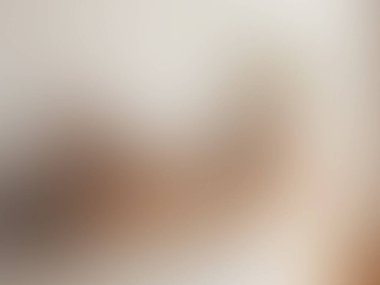 abstract pastel soft colorful smooth blurred textured background off focus toned in gold color