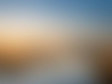 abstract pastel soft colorful smooth blurred textured background off focus toned in gold color