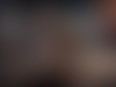 soyut pastel yumuşak renkli bulanık desenli arkaplan turuncu, sarı, bej ve gri renklerle odak tonlarında.